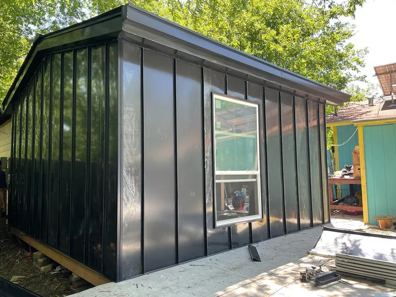 Black standing seam metal wall panels for Metal Roof Installation in Needham