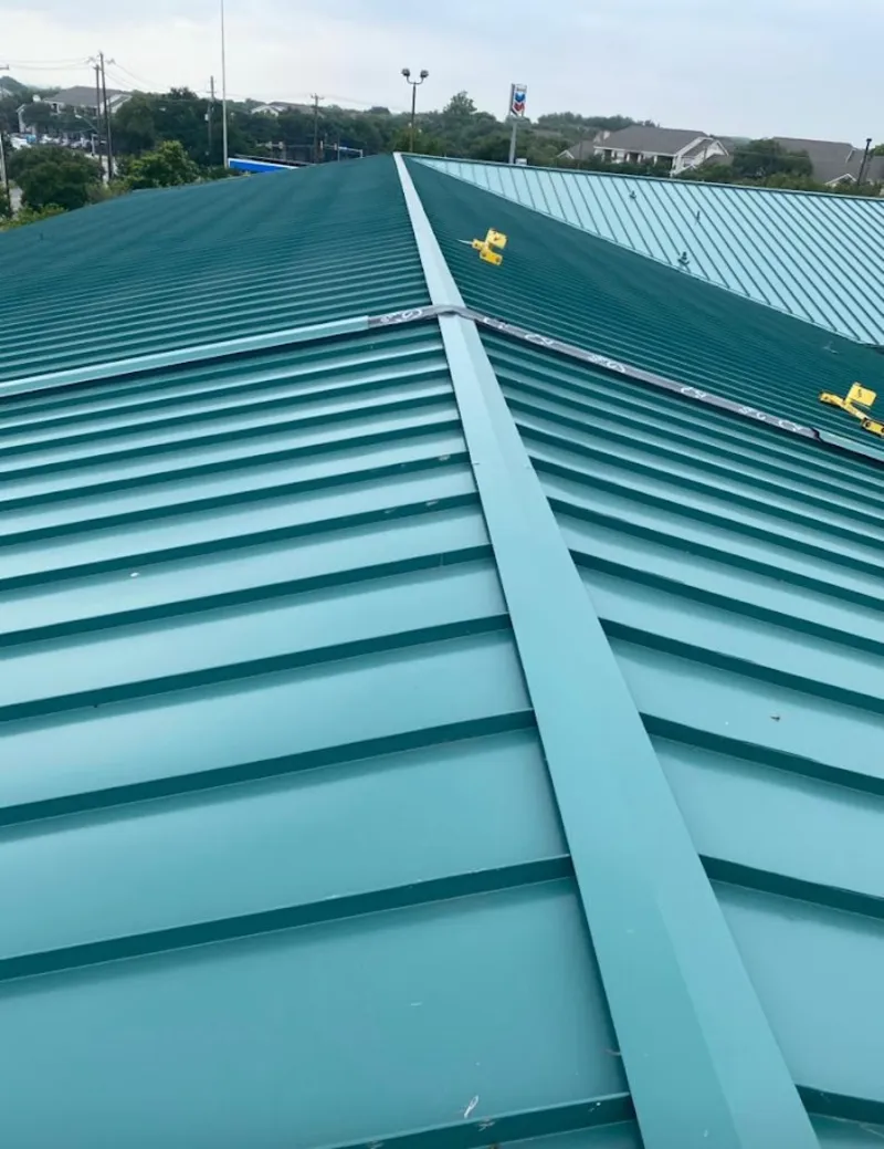 Green commercial metal roof ridge and valley for Metal Roof Repair in Needham