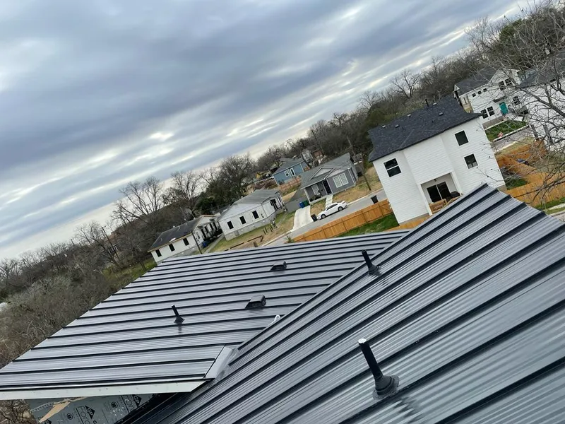 Standing seam metal roof panels with vents for Skylight Repair in Needham